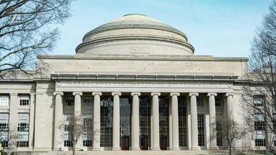 a white domed building in the classical style at MIT