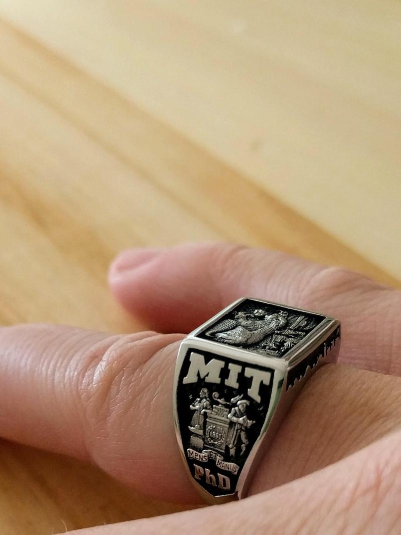 close up of an MIT brass rat class ring