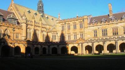 part of the Quadrangle at Sydney University, a sandstone building in the Victorian Academic Gothic Revival style