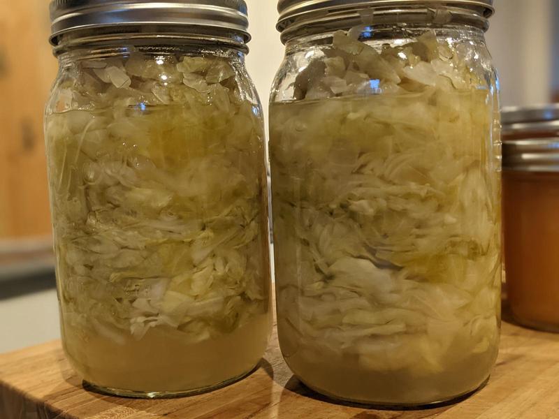 Two quart jars of homemade sauerkraut