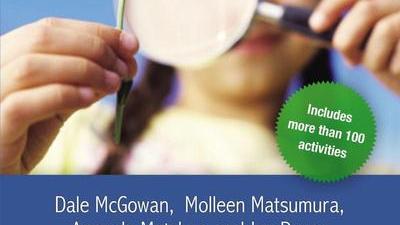 the cover of the book Raising Freethinkers by McGowan, Matsumura, Metskas, and Devor showing a child looking through a magnifying glass