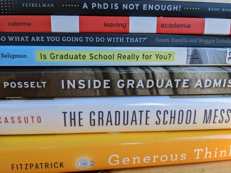 a stack of books about graduate school