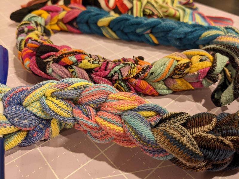 loops of old socks woven together into a weft rope