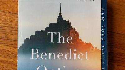 Paperback copy of the book The Benedict Option by Rod Dreher