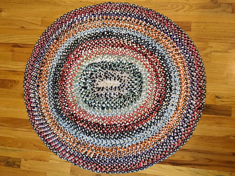 oval colorful braided t-shirt rag rug, about three feet across