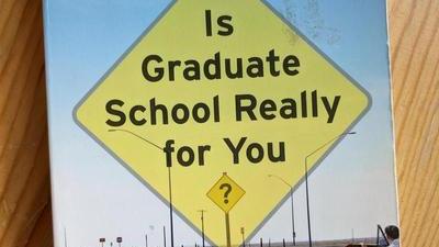 the cover of the book Is Graduate School Really for You? by Amanda I. Seligman, featuring a road splitting left and right with the title in a big yellow street sign above, and a person looking out of a stopped red car on the right road