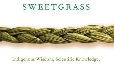 the cover of the book Braiding Sweetgrass by Robin Wall Kimmerer